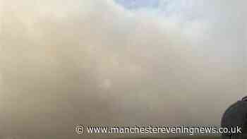 Tintwistle moor fire LIVE as major road shut and update issued with huge wildfire raging on