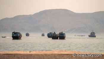 UN suspends Strait of Hormuz evacuation after ship 'hit by projectile'