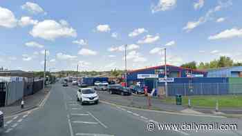 Newborn baby girl is found dead on industrial estate rubbish tip - as police launch urgent hunt for mother