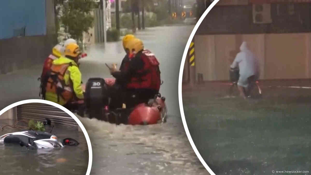Hevige storm zorgt voor drijvende scooters en overstroomde straten