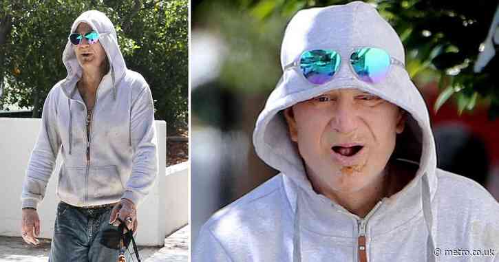 Mickey Rourke steps out dishevelled and missing teeth after facing financial trouble
