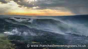 Tintwistle moor fire finally contained as emergency crews remain at scene
