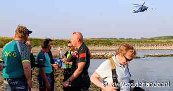 Hulpdiensten starten zoektocht voor persoon te water in de Waal bij Tiel, helikopter zoekt mee
