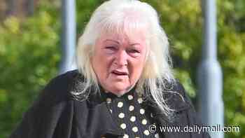 'Neighbour from hell' hit with restraining order after 15-year vendetta against couple - spying on them and throwing rotting dead moles over garden fence