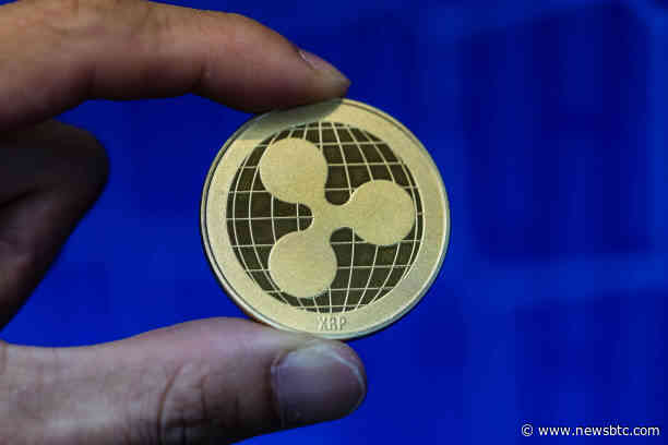 XRP Tests $1 Support As Long Liquidations Surge Inside Multi-Month Wedge