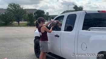 APA! and Central Texas Food Bank give food away to hundreds of people and pets every few months