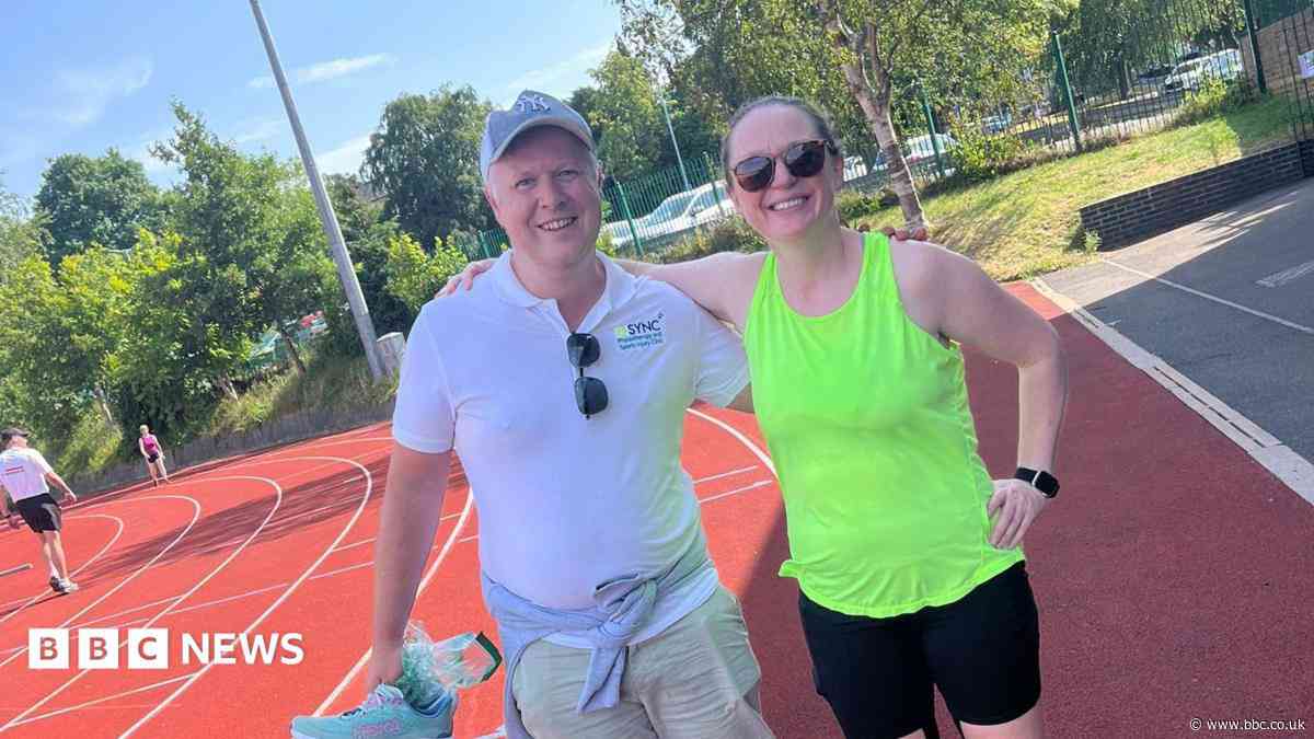 Woman completes 24-hour track challenge for school