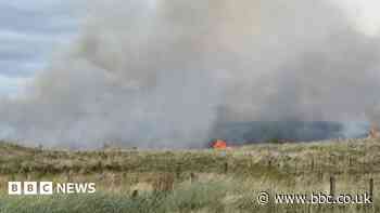 Wildfire warning issued as temperatures stay high