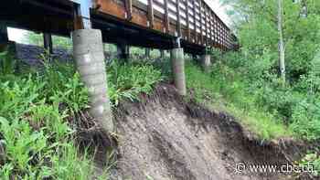 Heavy rain prompts some trail, sidewalk closures in Edmonton