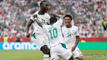 Senegal routs 10-man Iraq 5-0 to raise hopes of reaching World Cup knockout round