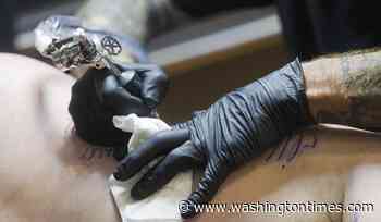 Florida tattoo shop draws backlash after owner bans military, calls troops 'war criminals'