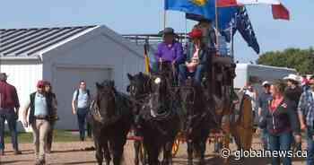 Canada, Alberta flags fly high at town parade during separatism debate