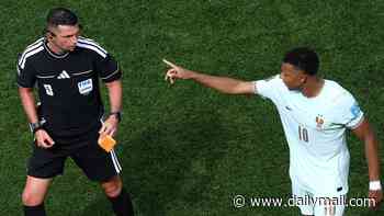 Astonishing moment France's 'dictator' captain Kylian Mbappe orders English referee Michael Oliver to hand his armband to France team-mate during thumping win over Norway