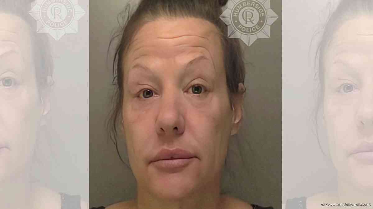 Woman 'suddenly and without warning' spat at police officer's face