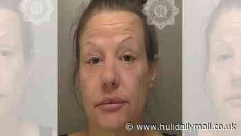 Woman 'suddenly and without warning' spat at police officer's face