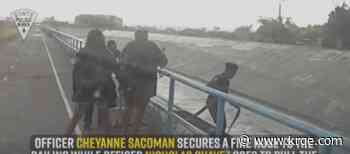 VIDEO: NMSP officers save man swept up in Albuquerque arroyo