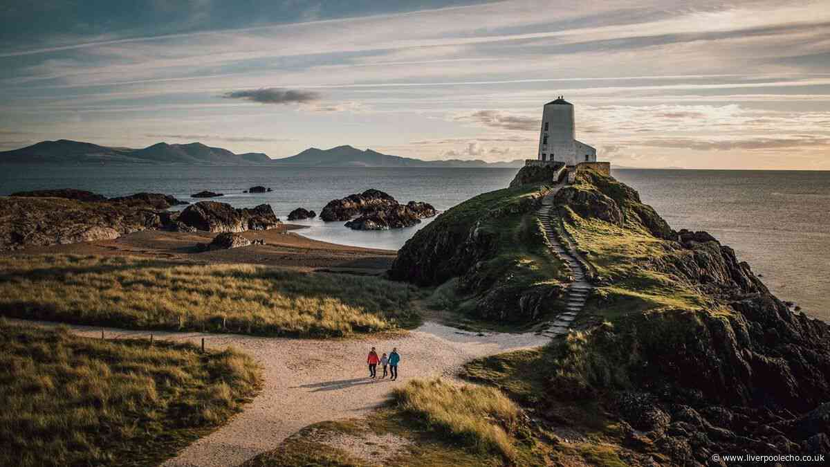 Fantasy North Wales beach with wild ponies, lighthouses and famous backdrop
