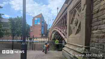 Investigation after body found in city river