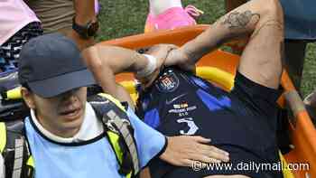 Heartbroken Manuel Ugarte leaves the pitch in tears as he is carried off on a stretcher on Uruguay World Cup duty - leaving Man United facing a nervous wait over star's fitness which could put huge midfield overhaul at risk