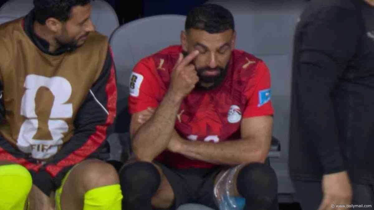 Egypt suffer World Cup injury blow as star man Mo Salah is seen with ice strapped to hamstring after being forced off against Iran