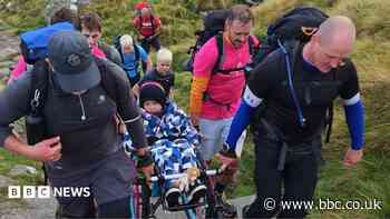 Dad to walk Three Peaks while carrying paraplegic son