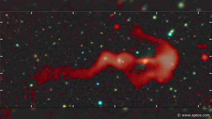 Strange glowing 'bow-and-arrow' structure may be a giant cosmic shock wave created by a supersonic galaxy collision