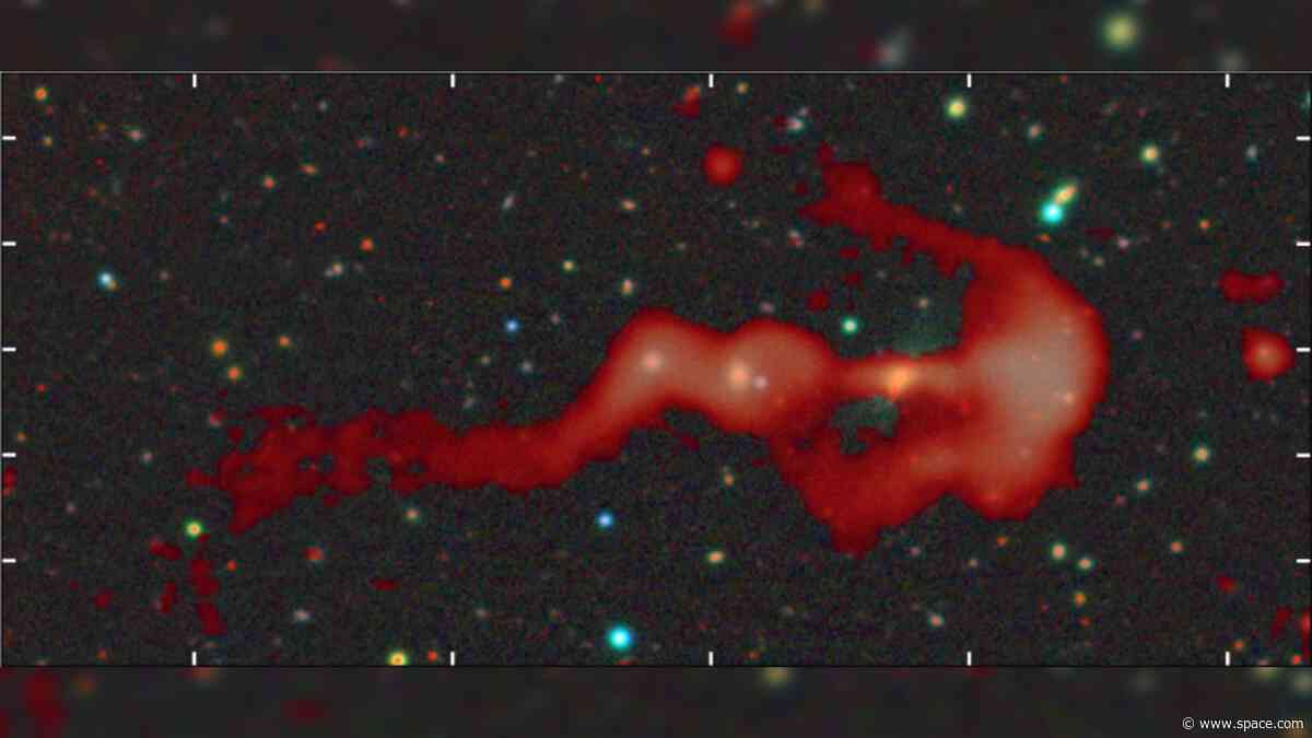 Strange glowing 'bow-and-arrow' structure may be a giant cosmic shock wave created by a supersonic galaxy collision