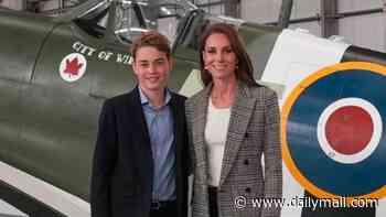 The royal heir force! Prince George is nearly as tall as Kate as they try out RAF planes on National Armed Forces Day 