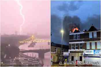 Dramatic thunderstorm hits London with lightning strike 'starting fire' at property as heat alert extended