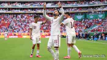 Spain wins its World Cup group, beating Uruguay 1-0 as Muslera's error sends 2-time champions home