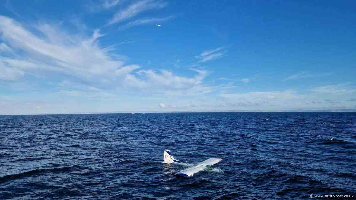 Plane crash lands in sea off UK coast as crew left floating on wing