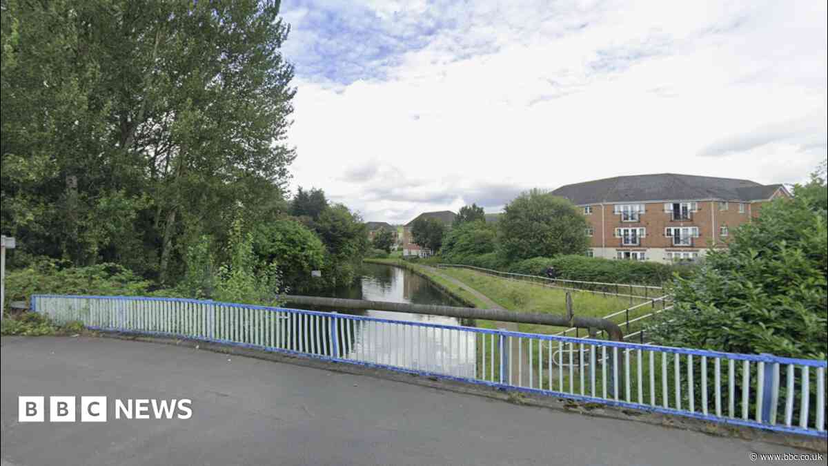 Body found in canal treated as 'unexplained'