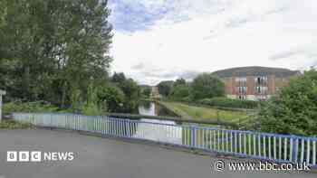 Body found in canal treated as 'unexplained'