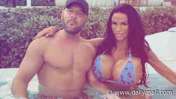Bikini-clad Katie Price drapes herself over Lee Andrews and brands them Britain's 'most hated people' - after husband was accused of scamming 'vulnerable woman' out of £5k