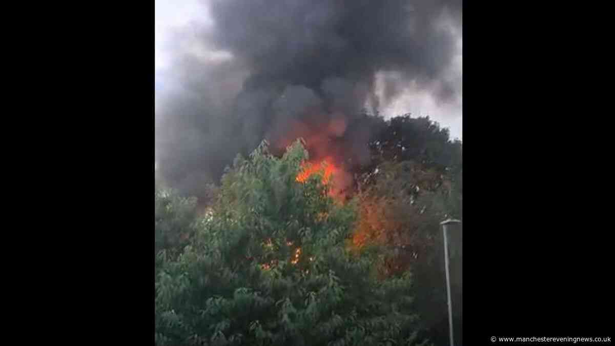 Oldham fire LIVE as huge blaze sends plumes of black smoke billowing into sky