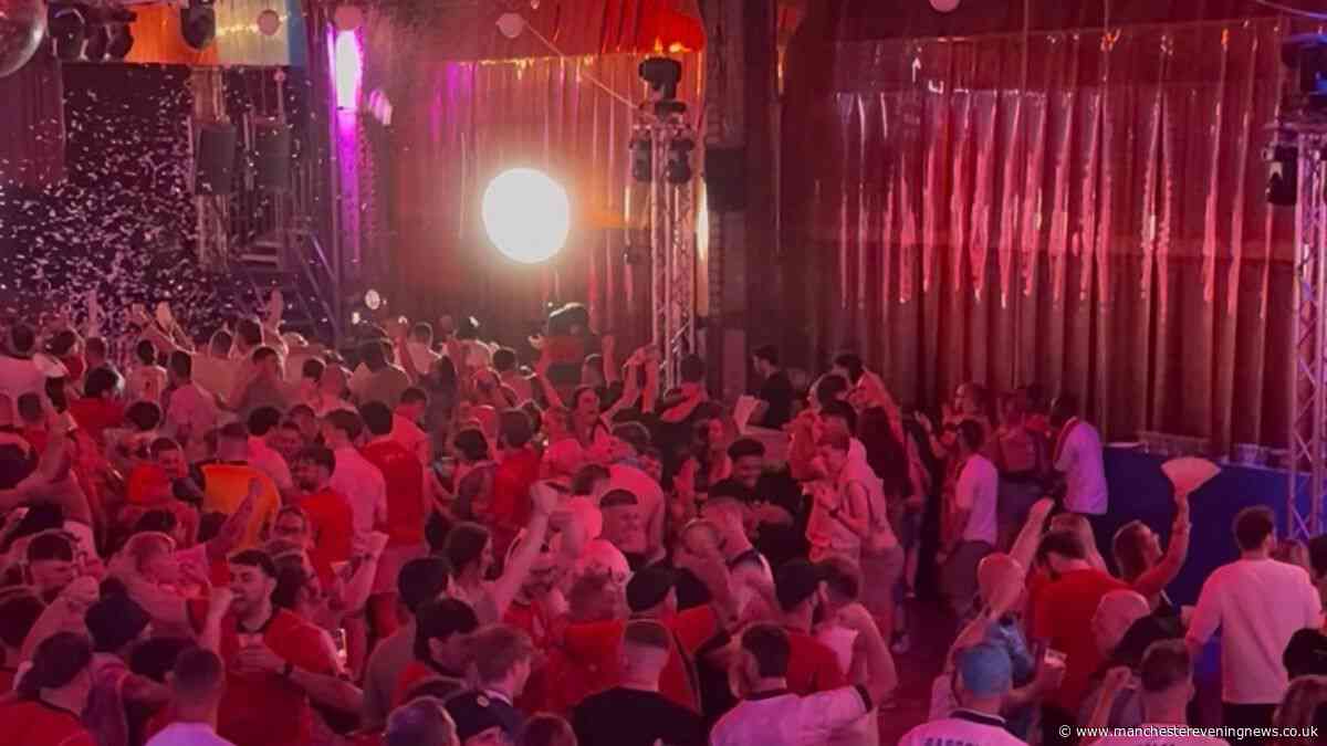 England fans in Manchester roar on the Three Lions to top World Cup Group