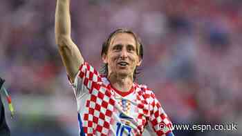 Ageless Modric sets record as Croatia advance