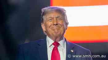 Trump unveils ‘patriot passports’ with new image of himself