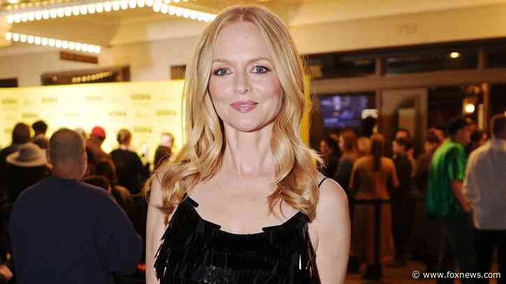 Heather Graham sizzles in white bikini during South of France getaway