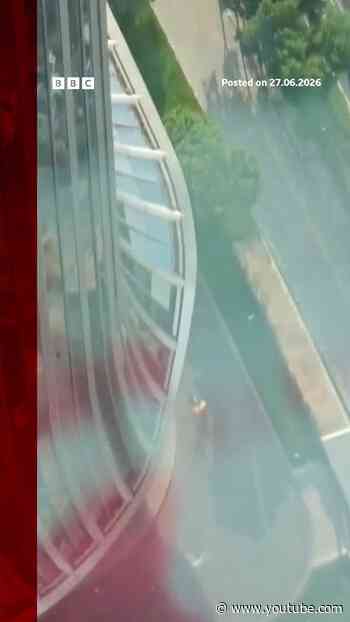 Debris falls after plane hits Beijing's tallest building. #BBCNews