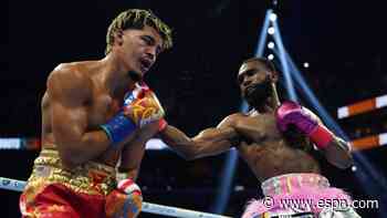 Ennis drops Zayas 3 times in dazzling title victory