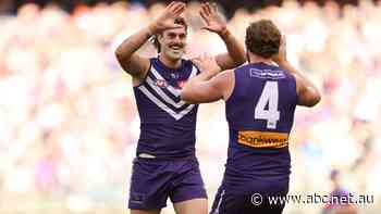 Live: Dockers make fast start against Suns as Kangaroos crack top 10