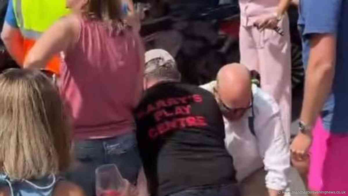 Man restrained by public after driving through barriers at Lancashire parade