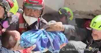 Videos show U.S. rescue team pull mother, baby from rubble in Venezuela