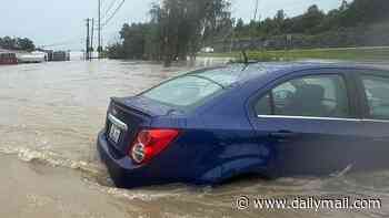 Roads turn to rivers as cataclysmic deadly floods sweep Kentucky on third day of life-threatening storm