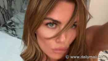 Abbey Clancy, 40, looks incredible as she poses topless for raunchy new bedroom photoshoot