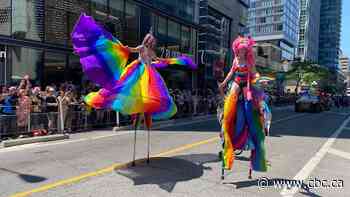 Annual Pride Parade marches through Toronto's downtown streets