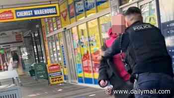 Tense scenes as police officer is caught on camera shoving a homeless man on the street in Penrith: 'F***ing go bro'