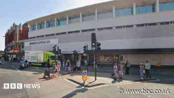 Man arrested on suspicion of attempted murder after car hits shoppers
