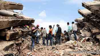 Father and son rescued after four days buried under Venezuela earthquake rubble
